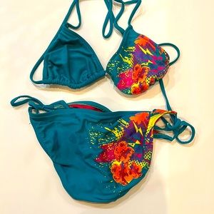 Xhilaration swim top size  medium and top size large .